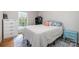 Cozy bedroom features a blue and white area rug and a large white dresser at 8544 Houston Ridge Rd, Charlotte, NC 28277