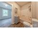 Well-lit bathroom with tub and grey vanity at 10 Bolt Dr, Shelby, NC 28150