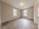 Bright bedroom with natural light streaming through windows and wood-look flooring at 10 Bolt Dr, Shelby, NC 28150