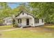 Charming home with black and white accents, and a welcoming front porch at 10 Bolt Dr, Shelby, NC 28150
