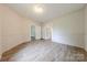 Bright, spacious living room with wood-look floors and fresh paint throughout at 10 Bolt Dr, Shelby, NC 28150