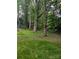 A large lot with lush trees and grass at 1002 Hemlock Dr, Shelby, NC 28150