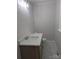 Well-lit bathroom featuring a modern vanity with stone countertop and a classic white toilet at 1002 Hemlock Dr, Shelby, NC 28150