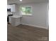 Bright kitchen area with an island, recessed lighting, and hardwood flooring at 1002 Hemlock Dr, Shelby, NC 28150