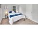Bedroom featuring plush carpet, bright window, and neutral wall color at 1101 Mona Dr, Charlotte, NC 28206