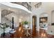 Grand foyer with high ceilings, wrought iron staircase, and hardwood floors at 1118 Seminole Dr, Fort Mill, SC 29707