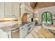 A gourmet kitchen features granite counters, modern appliances, and custom cabinetry at 1118 Seminole Dr, Fort Mill, SC 29707