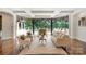 Stylish living room offering seamless indoor/outdoor living with views of a gorgeous pool at 1118 Seminole Dr, Fort Mill, SC 29707