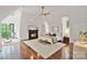 Spacious main bedroom suite with fireplace, hardwood floors, and balcony access at 1118 Seminole Dr, Fort Mill, SC 29707