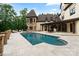 Backyard pool and patio area with lounge seating and dining space; ideal for entertaining at 1118 Seminole Dr, Fort Mill, SC 29707