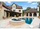 Backyard oasis featuring a pool, spa, outdoor seating, and a covered dining area at 1118 Seminole Dr, Fort Mill, SC 29707