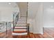 Staircase with wrought iron and wood detailing provides access to multiple levels at 1118 Seminole Dr, Fort Mill, SC 29707
