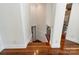 The staircase features hardwood floors and iron railing at 1118 Seminole Dr, Fort Mill, SC 29707