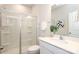 Clean bathroom featuring a glass-enclosed shower, white vanity, and modern fixtures at 1119 Bellshill Dv, Indian Trail, NC 28079