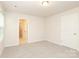 This bedroom features neutral walls, plush carpeting, and ample natural light from a window at 1119 Bellshill Dv, Indian Trail, NC 28079