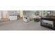 Versatile living area featuring a wet bar, fireplace, and comfortable seating for relaxation and entertainment at 1200 Firethorne Club Dr, Waxhaw, NC 28173