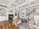 Spacious living room with fireplace, built-ins, and hardwood floors at 1200 Firethorne Club Dr, Waxhaw, NC 28173