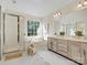 Bright and airy bathroom with a soaking tub, walk-in shower, and dual vanities at 12632 Landing Green Dr, Charlotte, NC 28277