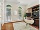 Bright living room with ample natural light, hardwood floors, and decorative furniture at 12632 Landing Green Dr, Charlotte, NC 28277