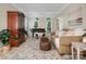 Inviting living room with neutral tones, piano, comfortable seating and classic decor at 12632 Landing Green Dr, Charlotte, NC 28277