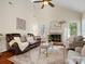 Bright living room with a fireplace, vaulted ceiling, and stylish decor at 12632 Landing Green Dr, Charlotte, NC 28277