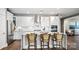Modern kitchen featuring stainless steel appliances, white cabinets, and granite countertops at 13241 Cozy Ct, Charlotte, NC 28215