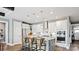 Modern kitchen featuring stainless steel appliances, white cabinets, and granite countertops at 13241 Cozy Ct, Charlotte, NC 28215