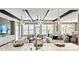 Bright living room with coffered ceilings, a ceiling fan, and large windows at 13241 Cozy Ct, Charlotte, NC 28215