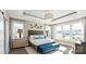 Serene main bedroom with tray ceiling, large windows, and stylish furnishings at 13241 Cozy Ct, Charlotte, NC 28215