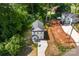 Aerial view of the house showcasing it's placement in a community surrounded by trees and other vegetation at 1411 Duhart Ave, Gastonia, NC 28054