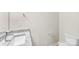 Bright bathroom features granite countertops, white fixtures, and a modern faucet at 1411 Duhart Ave, Gastonia, NC 28054