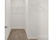 This closet has carpeted flooring and wire shelving, providing convenient storage at 1411 Duhart Ave, Gastonia, NC 28054