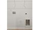 Utility closet with wire shelves and connections for a washer and dryer at 1411 Duhart Ave, Gastonia, NC 28054