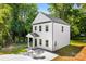 This home features white siding, a well-manicured lawn and a driveway for parking at 1411 Duhart Ave, Gastonia, NC 28054