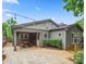 Backyard patio includes an outdoor dining area and a well-maintained exterior at 1425 Downs Ave, Charlotte, NC 28205