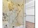 Tiled walk-in shower with glass enclosure and modern fixtures at 1425 Downs Ave, Charlotte, NC 28205