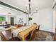 Elegant dining room featuring stylish decor, modern lighting, and an open layout at 1425 Downs Ave, Charlotte, NC 28205