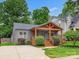 Charming single-story home features a welcoming porch and well-manicured lawn at 1425 Downs Ave, Charlotte, NC 28205