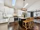 Modern kitchen features stainless steel appliances, island with seating, and an open floor plan at 1425 Downs Ave, Charlotte, NC 28205