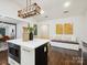 Eat-in kitchen island with seating and decor in a well-lit, modern space at 1425 Downs Ave, Charlotte, NC 28205