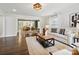 Bright living room with hardwood floors, modern furniture, and an open floor plan at 1425 Downs Ave, Charlotte, NC 28205