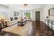 Bright living room with hardwood floors, modern furniture, and an open floor plan at 1425 Downs Ave, Charlotte, NC 28205