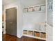 Mudroom with built-in bench and storage with stylish decor at 1425 Downs Ave, Charlotte, NC 28205