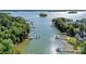 Beautiful lakefront property featuring several private docks surrounded by lush greenery and tranquil waters at 143 Jeremy Point Pl, Mooresville, NC 28117