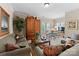 Spacious living room with two sofas, an entertainment center, and a sitting area at 143 Jeremy Point Pl, Mooresville, NC 28117