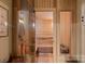 Home sauna with wooden benches and glass door at 143 Jeremy Point Pl, Mooresville, NC 28117