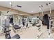 Fully equipped workout room with mirrors and various exercise machines at 143 Jeremy Point Pl, Mooresville, NC 28117