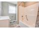 Bathroom features a shower-tub combo, and updated vanity at 1690 Montevista Dr, Shelby, NC 28150
