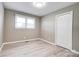 Bedroom features updated flooring, neutral paint, and natural light at 1690 Montevista Dr, Shelby, NC 28150