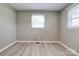 This bedroom is airy and provides a well-lit space from the large windows at 1690 Montevista Dr, Shelby, NC 28150